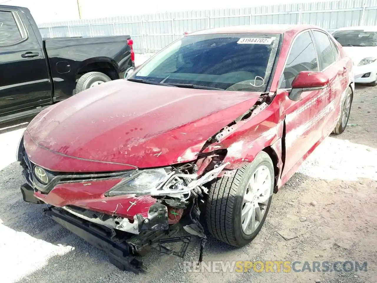 2 Photograph of a damaged car 4T1B11HK4KU242346 TOYOTA CAMRY 2019