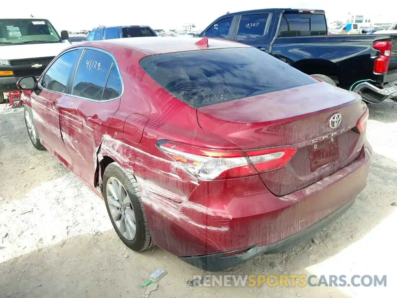 3 Photograph of a damaged car 4T1B11HK4KU242346 TOYOTA CAMRY 2019