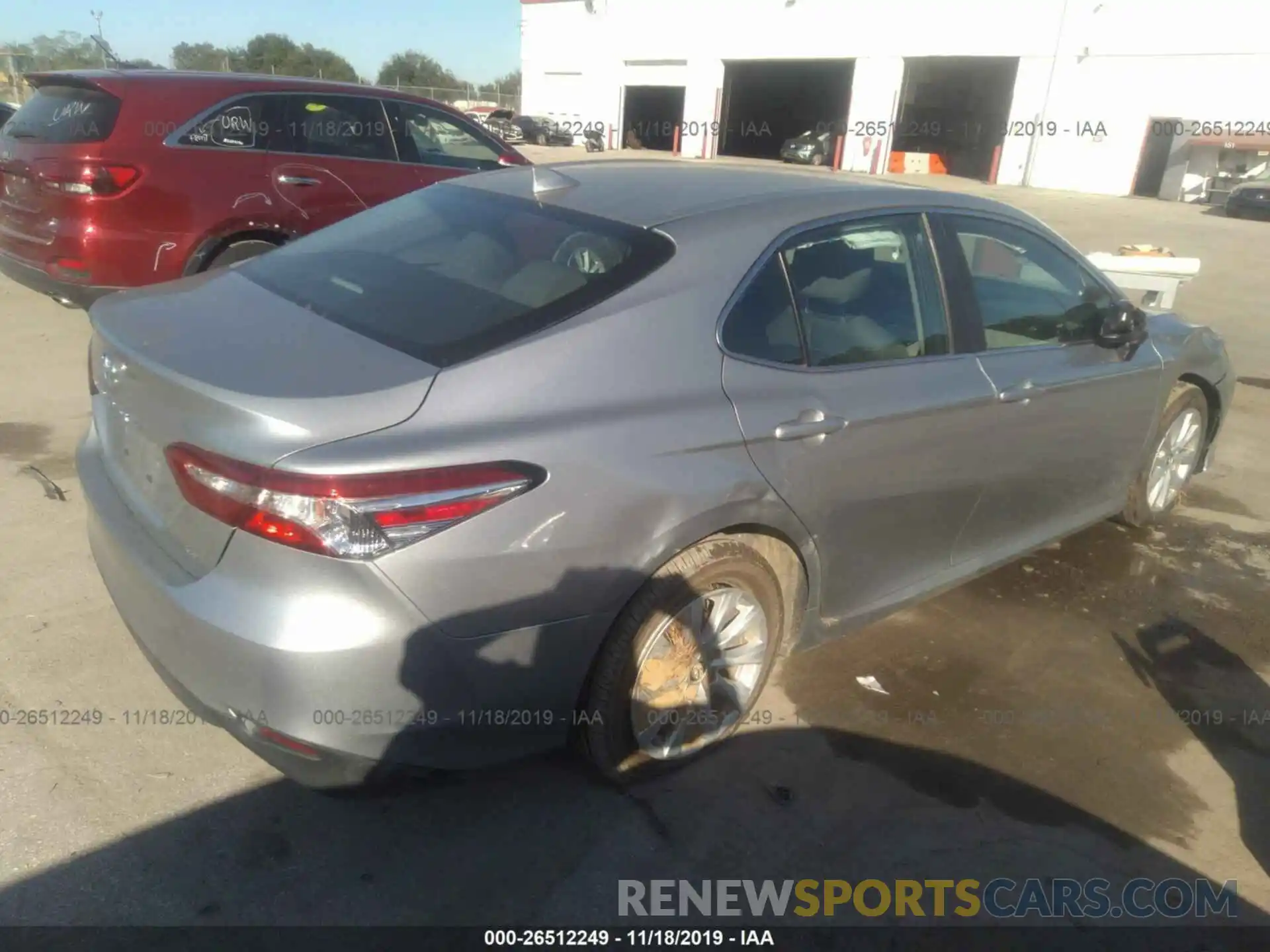 4 Photograph of a damaged car 4T1B11HK4KU242377 TOYOTA CAMRY 2019