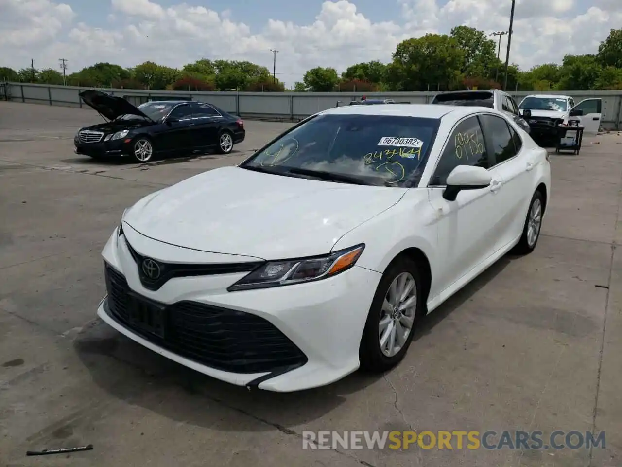 2 Photograph of a damaged car 4T1B11HK4KU243464 TOYOTA CAMRY 2019