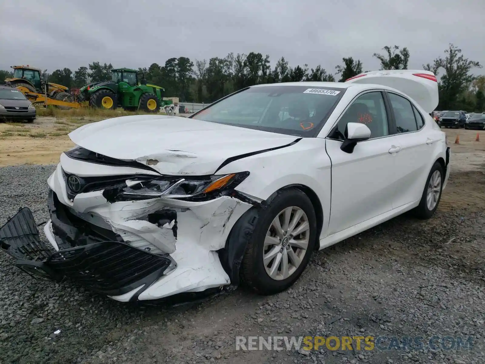 2 Photograph of a damaged car 4T1B11HK4KU243500 TOYOTA CAMRY 2019