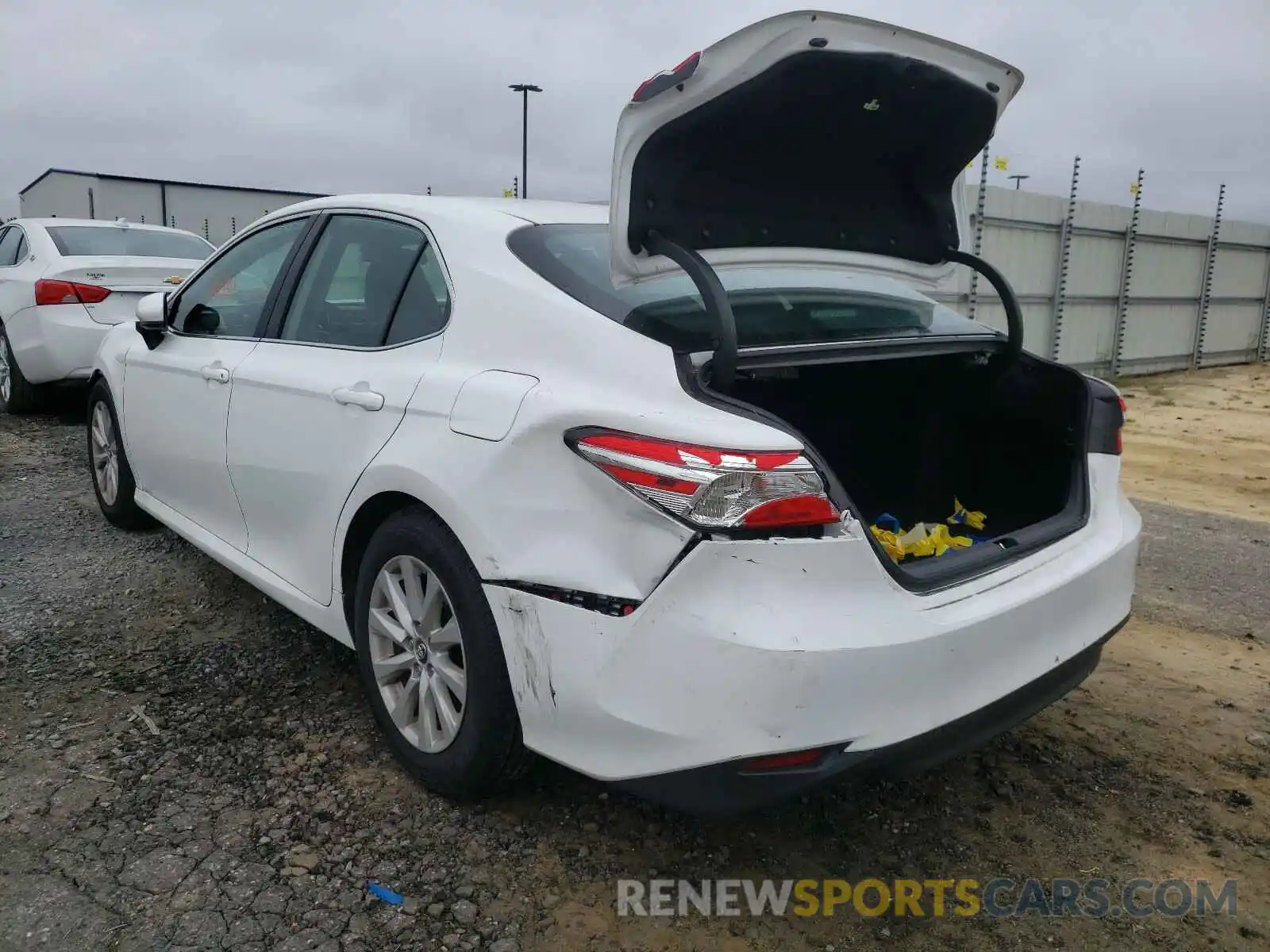 3 Photograph of a damaged car 4T1B11HK4KU243500 TOYOTA CAMRY 2019