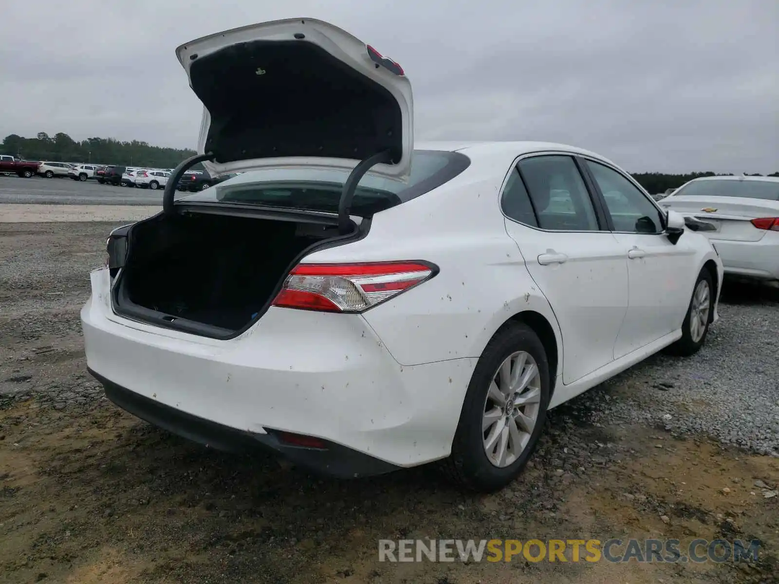 4 Photograph of a damaged car 4T1B11HK4KU243500 TOYOTA CAMRY 2019