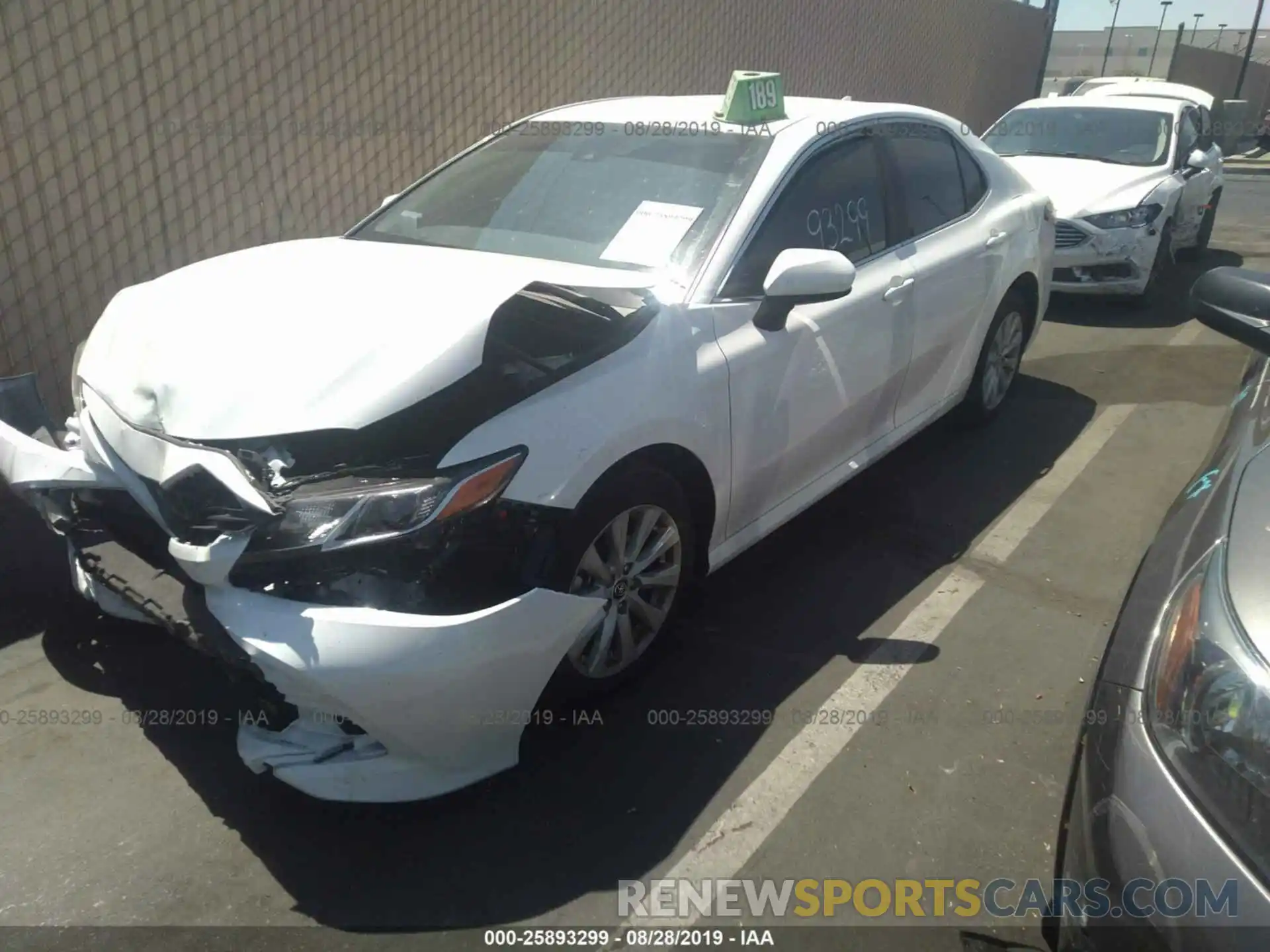 2 Photograph of a damaged car 4T1B11HK4KU244257 TOYOTA CAMRY 2019