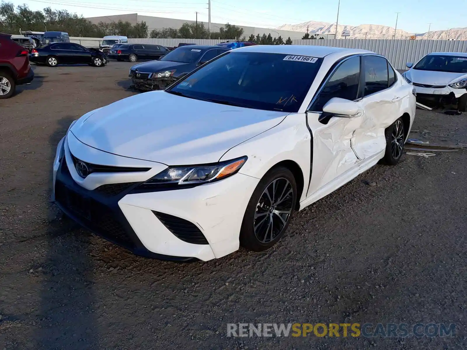 2 Photograph of a damaged car 4T1B11HK4KU244369 TOYOTA CAMRY 2019