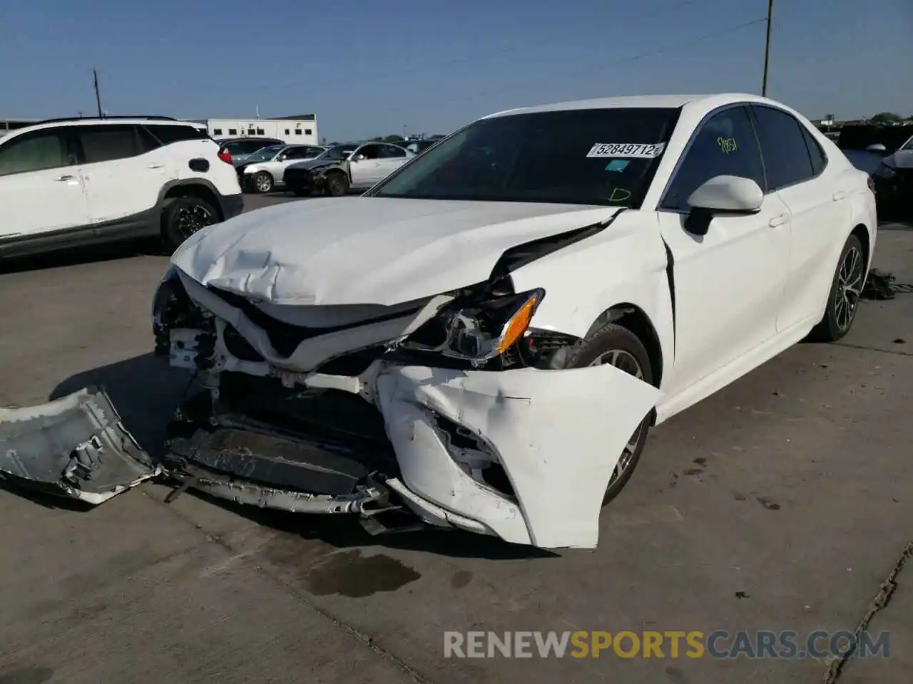 2 Photograph of a damaged car 4T1B11HK4KU246879 TOYOTA CAMRY 2019