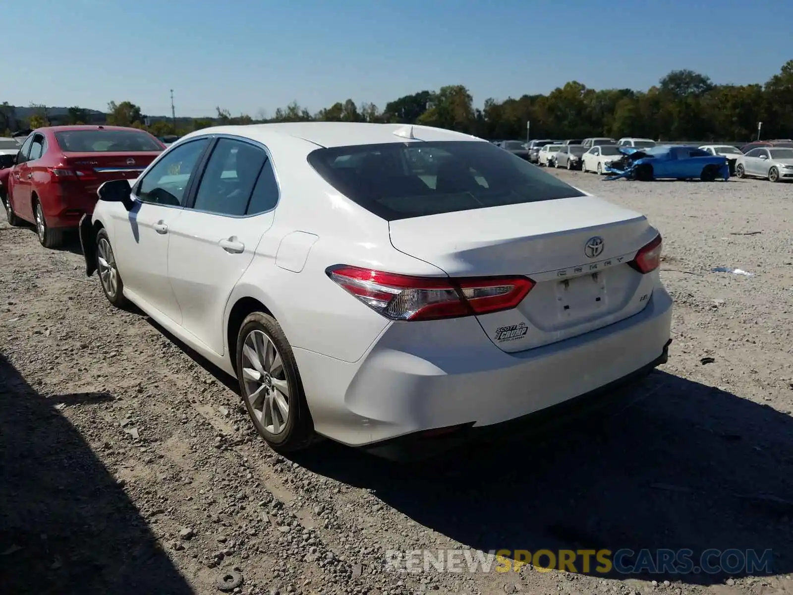 3 Photograph of a damaged car 4T1B11HK4KU246977 TOYOTA CAMRY 2019