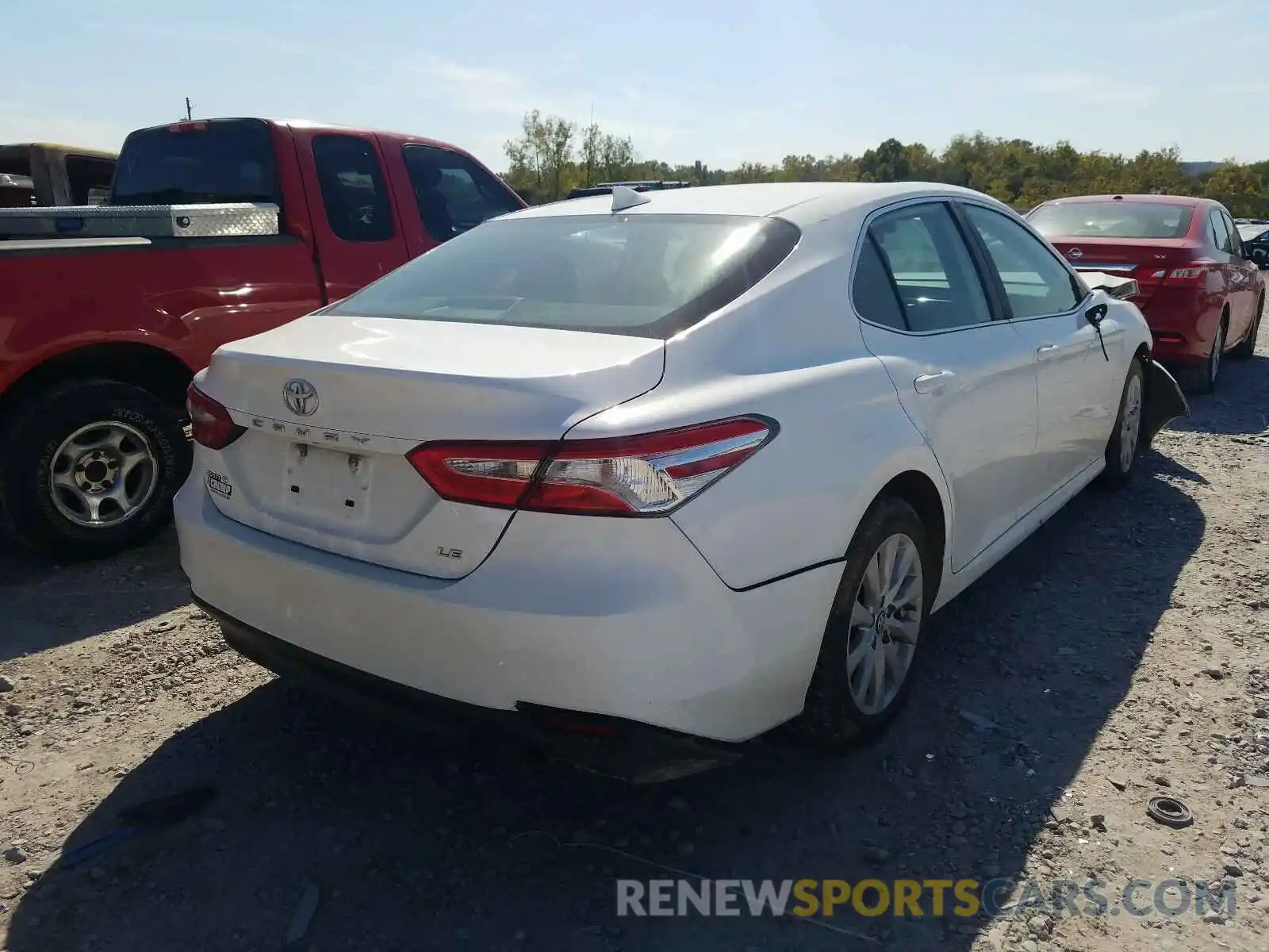 4 Photograph of a damaged car 4T1B11HK4KU246977 TOYOTA CAMRY 2019