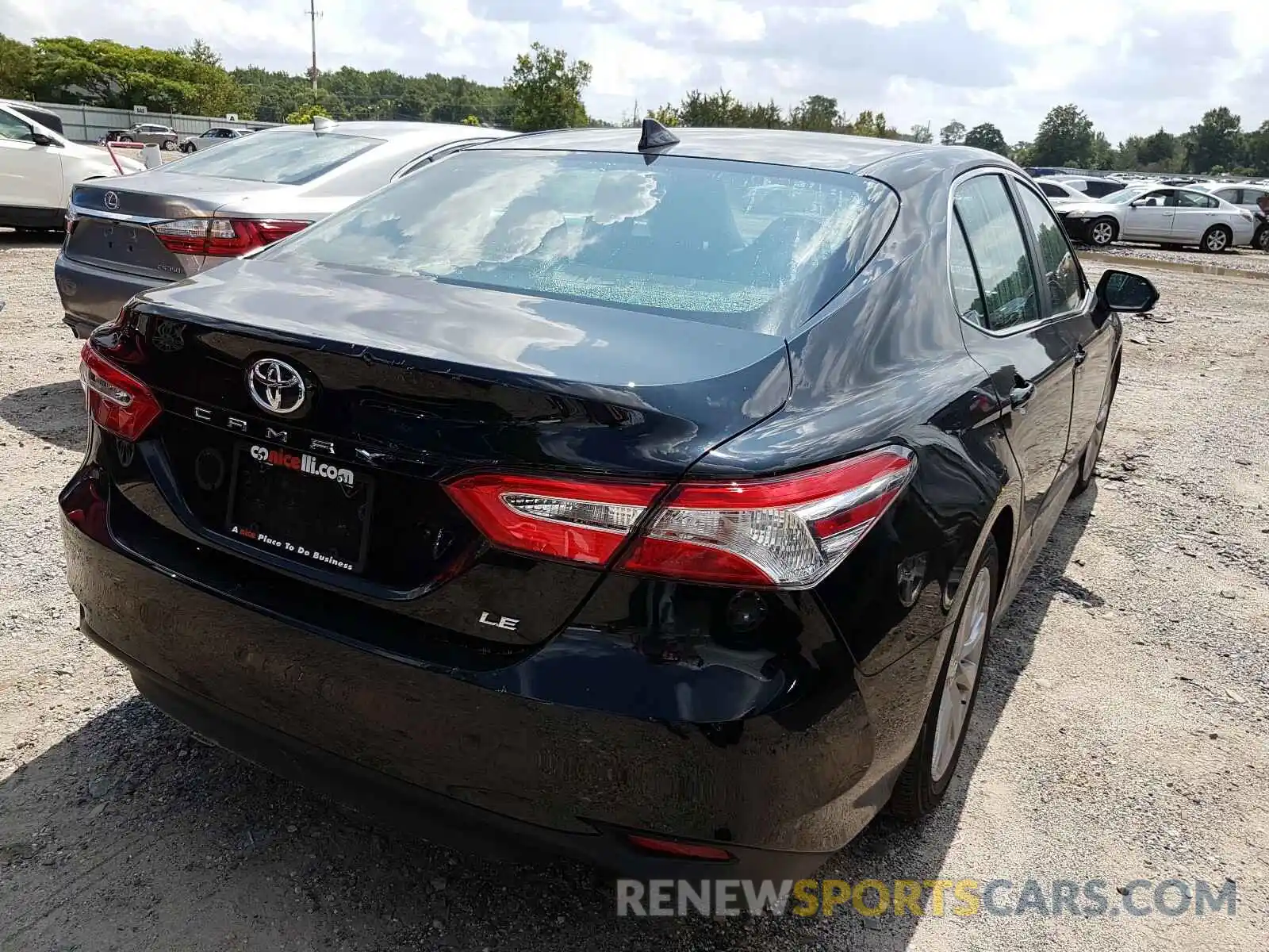 4 Photograph of a damaged car 4T1B11HK4KU248003 TOYOTA CAMRY 2019