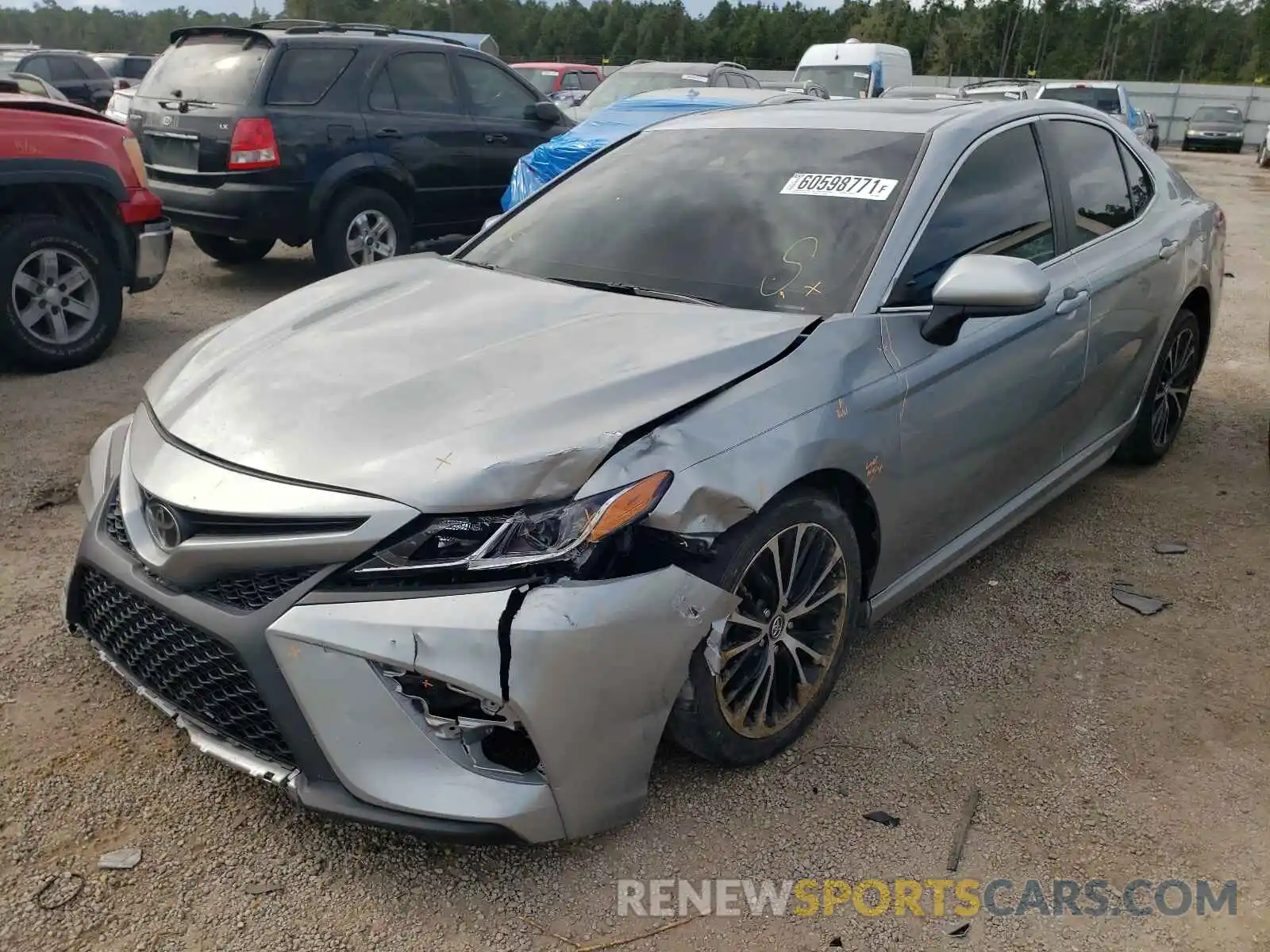 2 Photograph of a damaged car 4T1B11HK4KU249636 TOYOTA CAMRY 2019