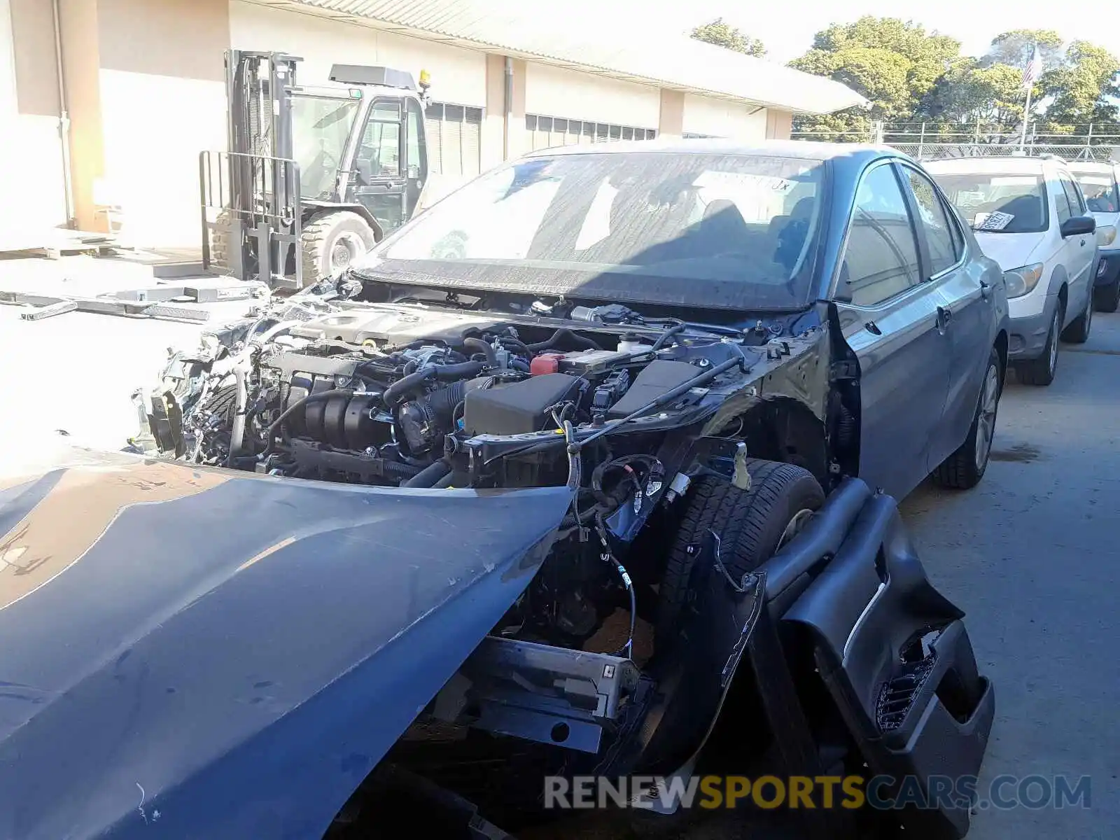 2 Photograph of a damaged car 4T1B11HK4KU249927 TOYOTA CAMRY 2019