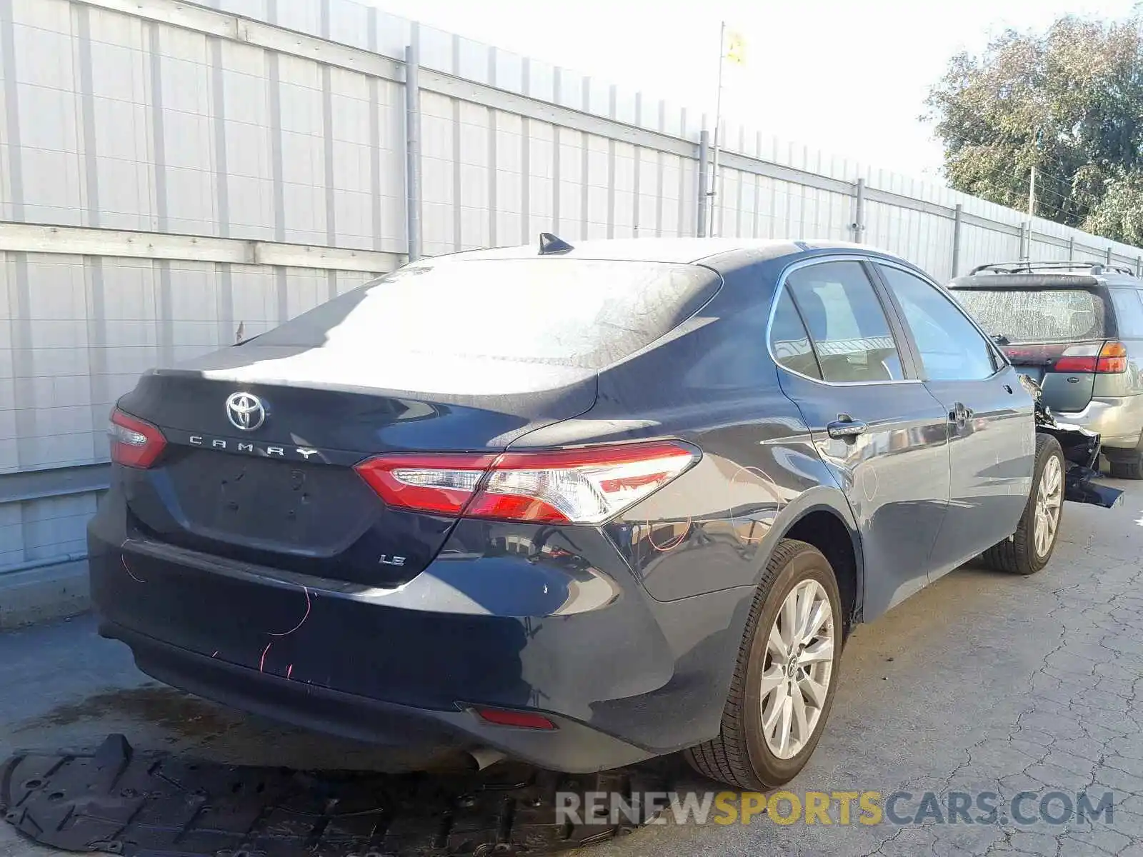 4 Photograph of a damaged car 4T1B11HK4KU249927 TOYOTA CAMRY 2019