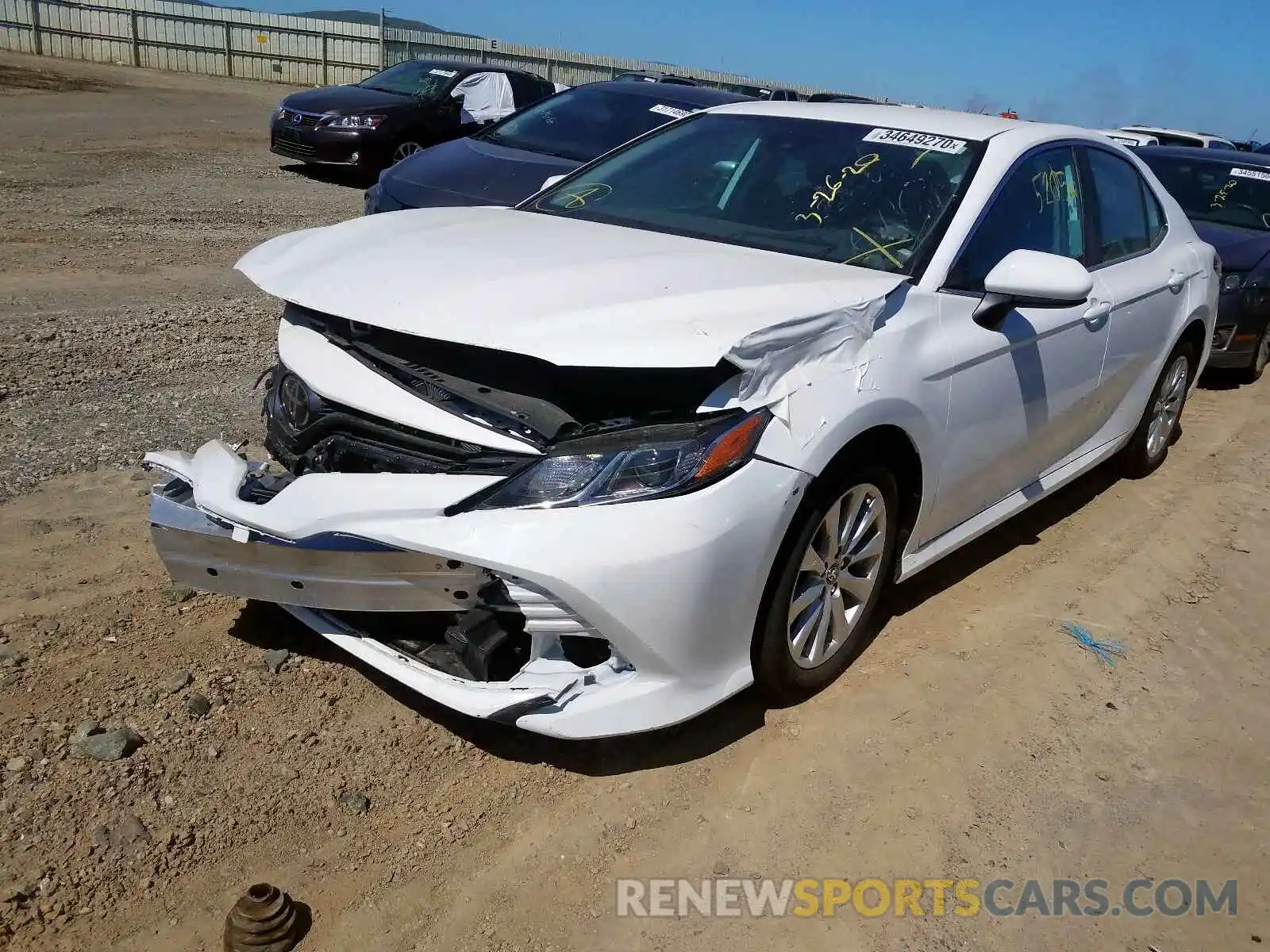 2 Photograph of a damaged car 4T1B11HK4KU249944 TOYOTA CAMRY 2019