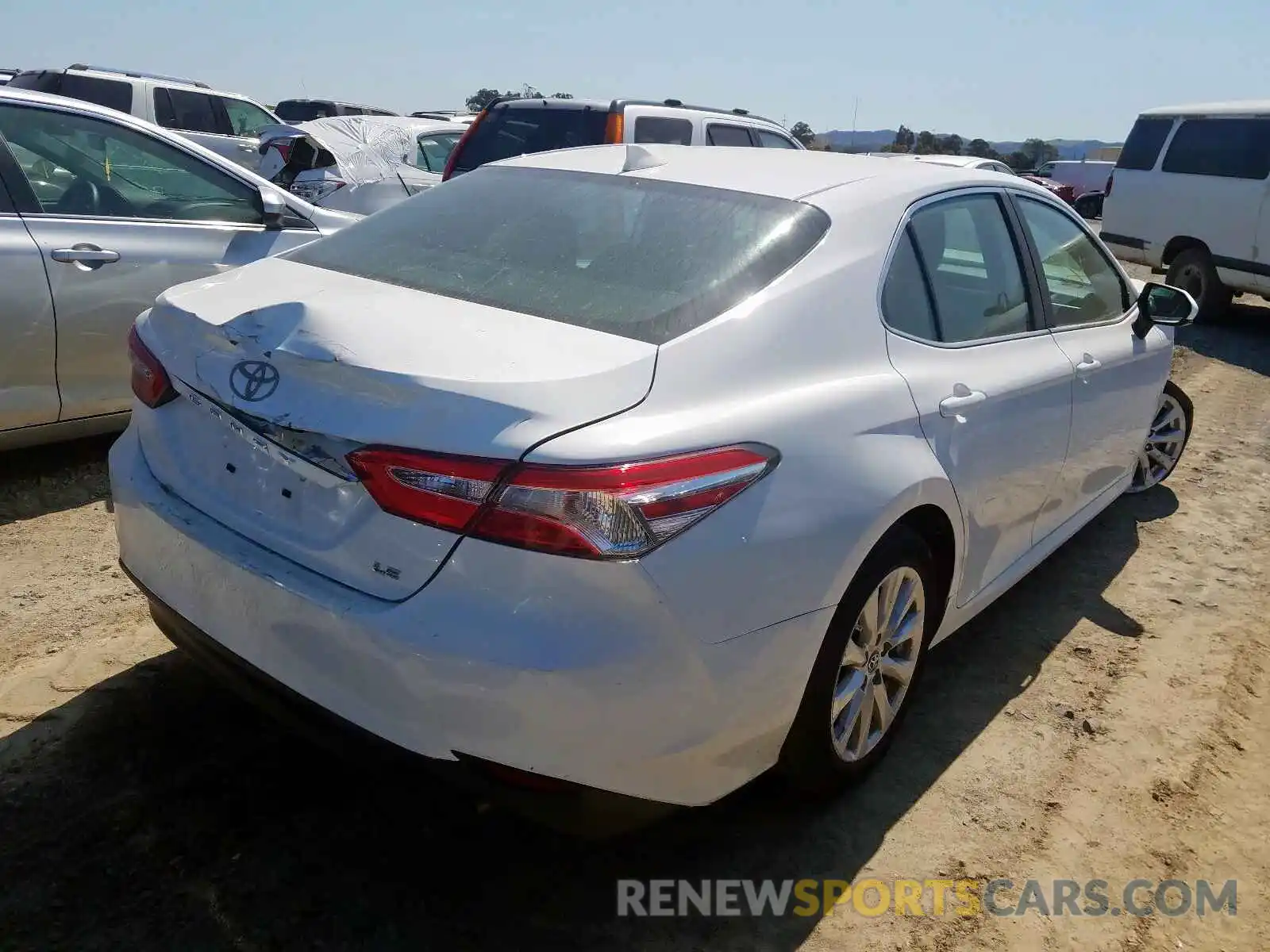 4 Photograph of a damaged car 4T1B11HK4KU249944 TOYOTA CAMRY 2019