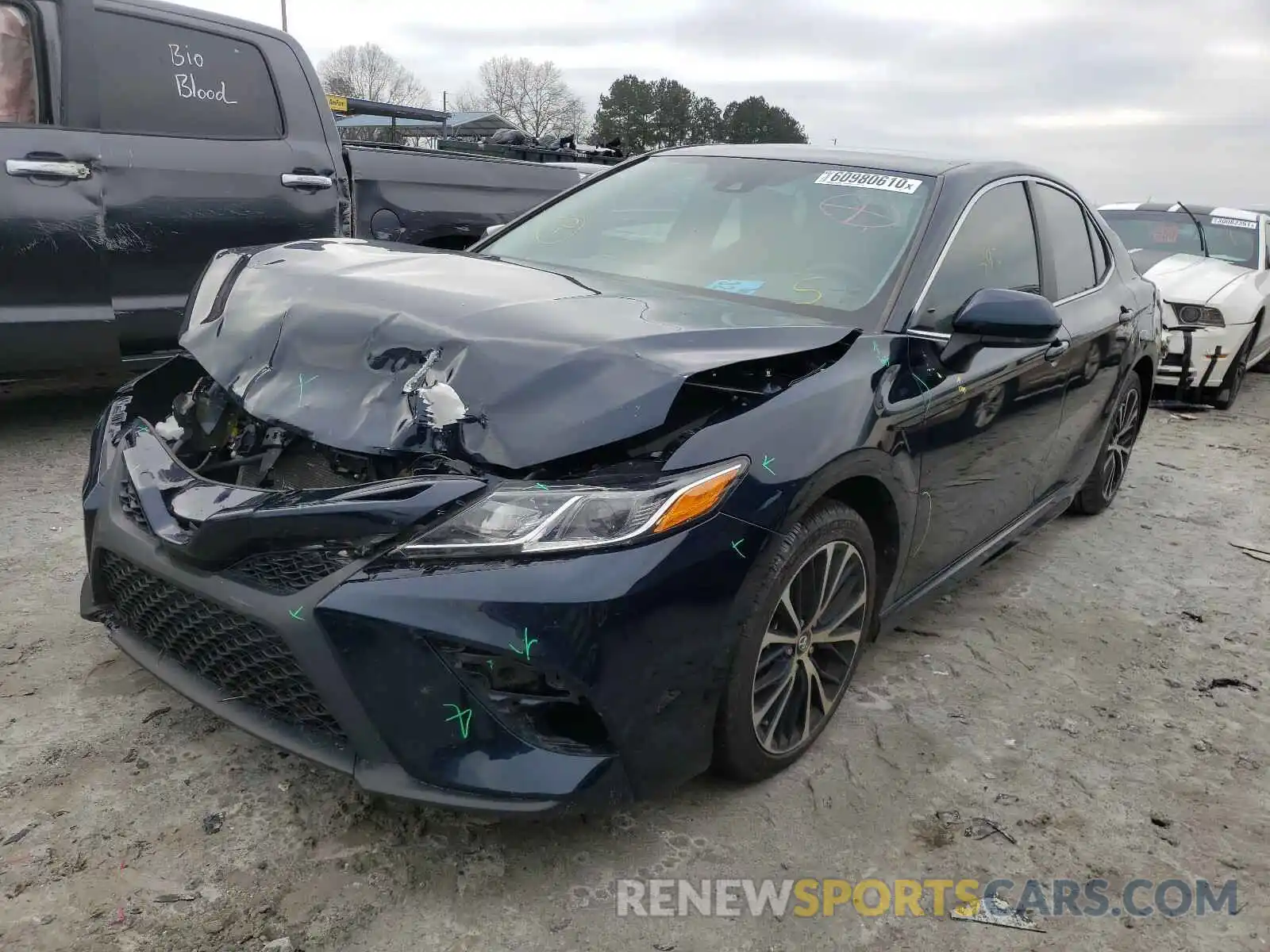 2 Photograph of a damaged car 4T1B11HK4KU250382 TOYOTA CAMRY 2019