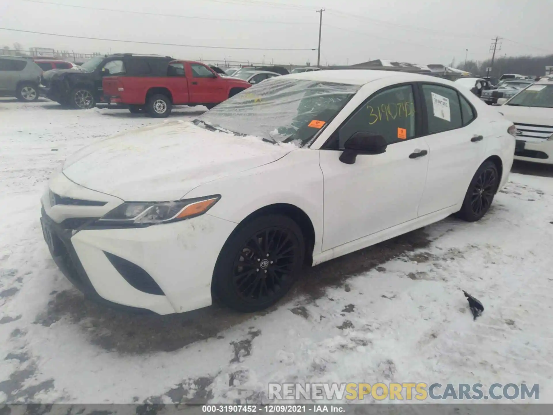 2 Photograph of a damaged car 4T1B11HK4KU251368 TOYOTA CAMRY 2019