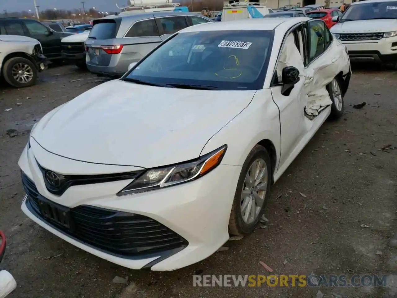 2 Photograph of a damaged car 4T1B11HK4KU253007 TOYOTA CAMRY 2019