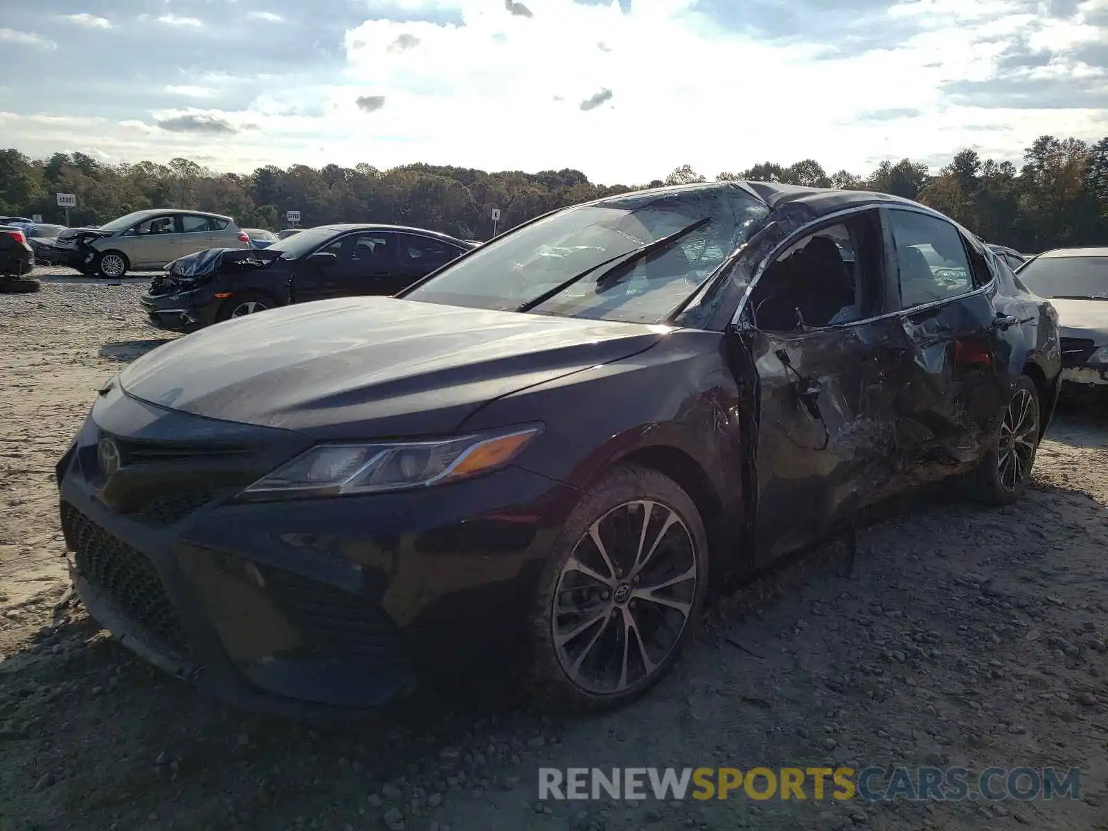 2 Photograph of a damaged car 4T1B11HK4KU254433 TOYOTA CAMRY 2019