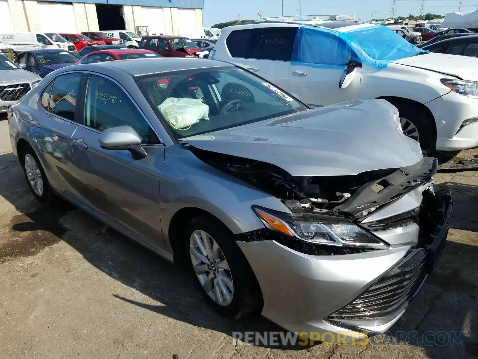 1 Photograph of a damaged car 4T1B11HK4KU256358 TOYOTA CAMRY 2019