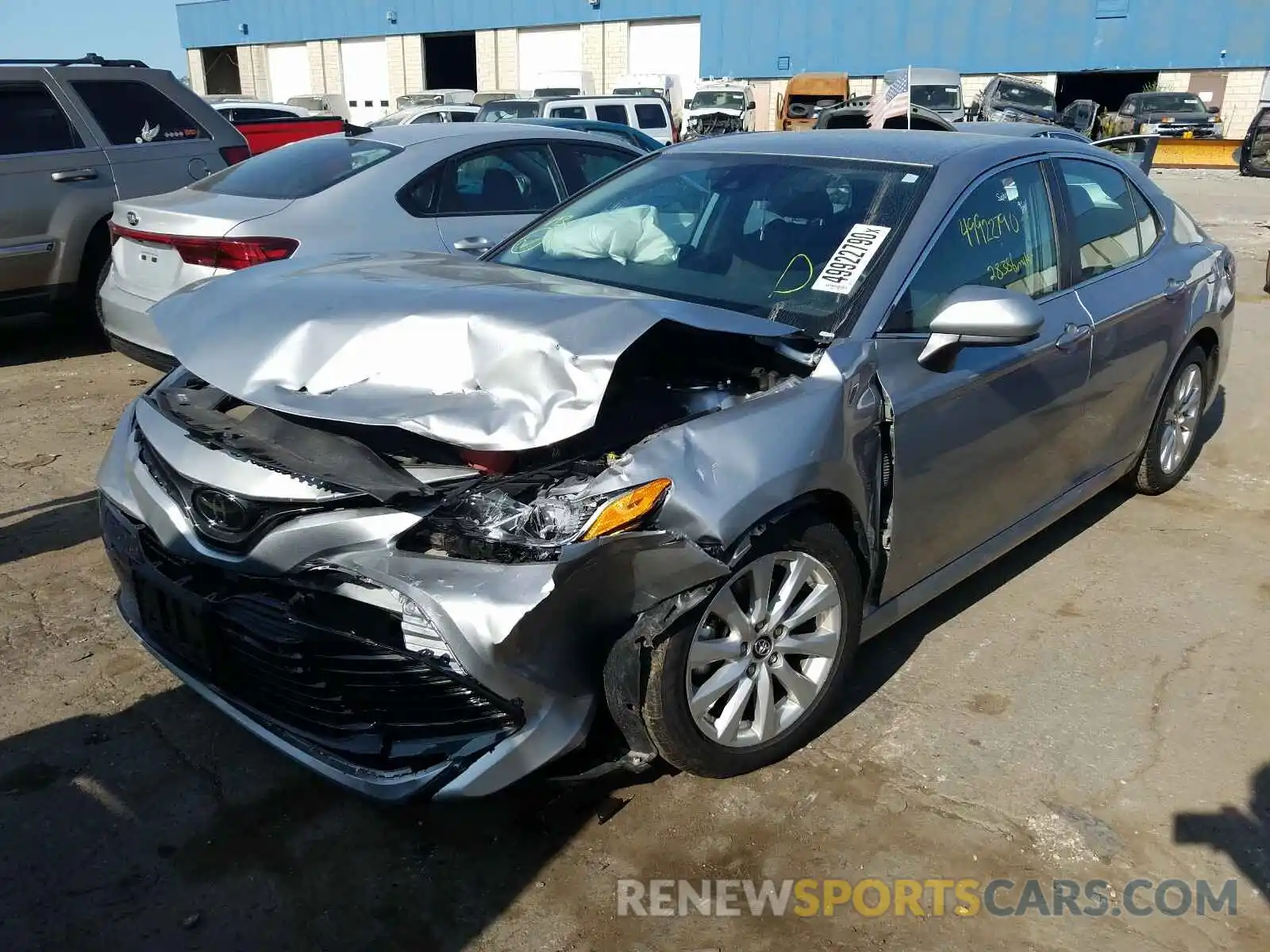 2 Photograph of a damaged car 4T1B11HK4KU256358 TOYOTA CAMRY 2019