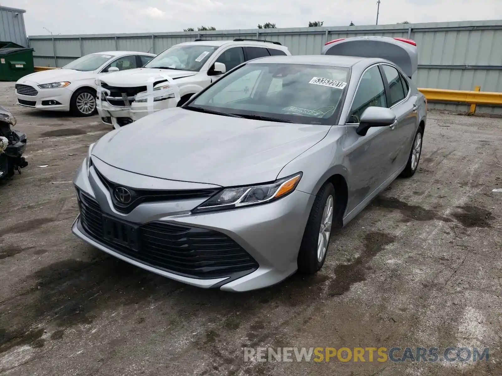 2 Photograph of a damaged car 4T1B11HK4KU256988 TOYOTA CAMRY 2019