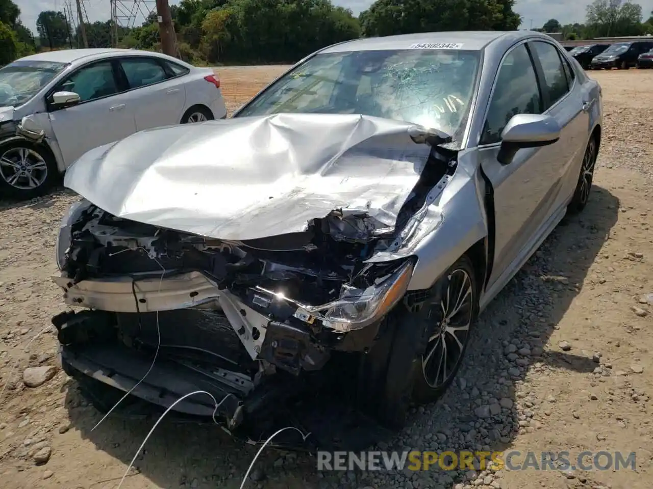 2 Photograph of a damaged car 4T1B11HK4KU257297 TOYOTA CAMRY 2019