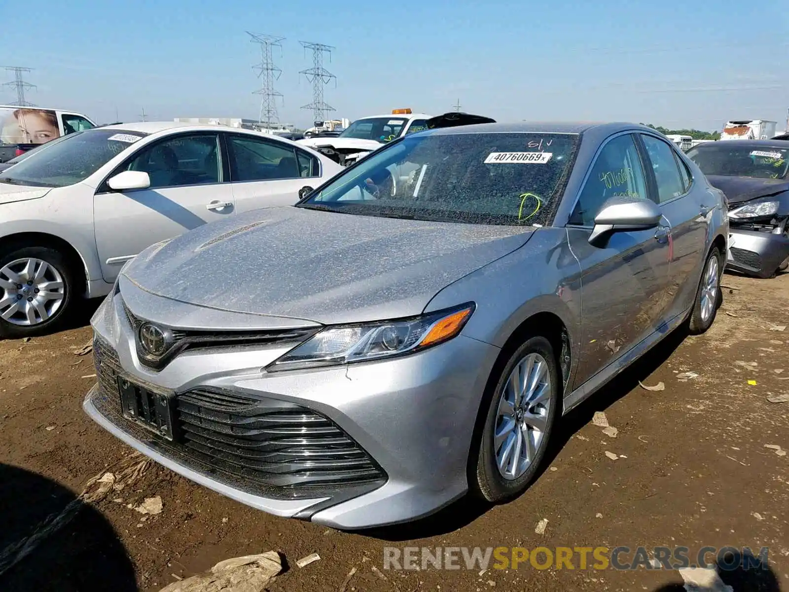 2 Photograph of a damaged car 4T1B11HK4KU257669 TOYOTA CAMRY 2019