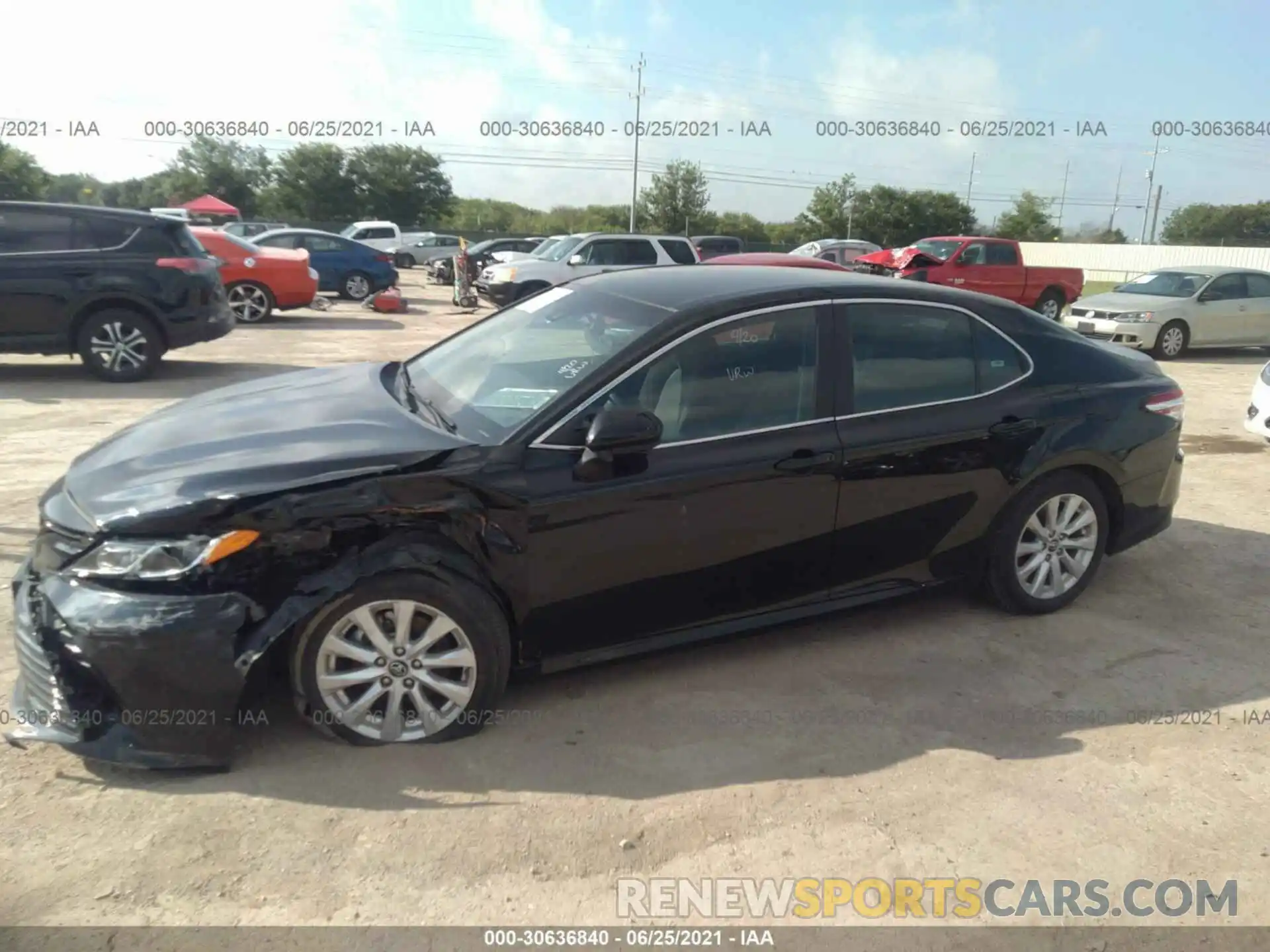 2 Photograph of a damaged car 4T1B11HK4KU257977 TOYOTA CAMRY 2019