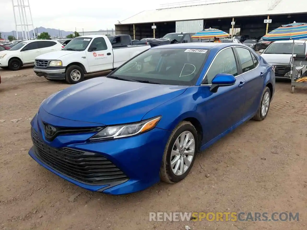 2 Photograph of a damaged car 4T1B11HK4KU258658 TOYOTA CAMRY 2019