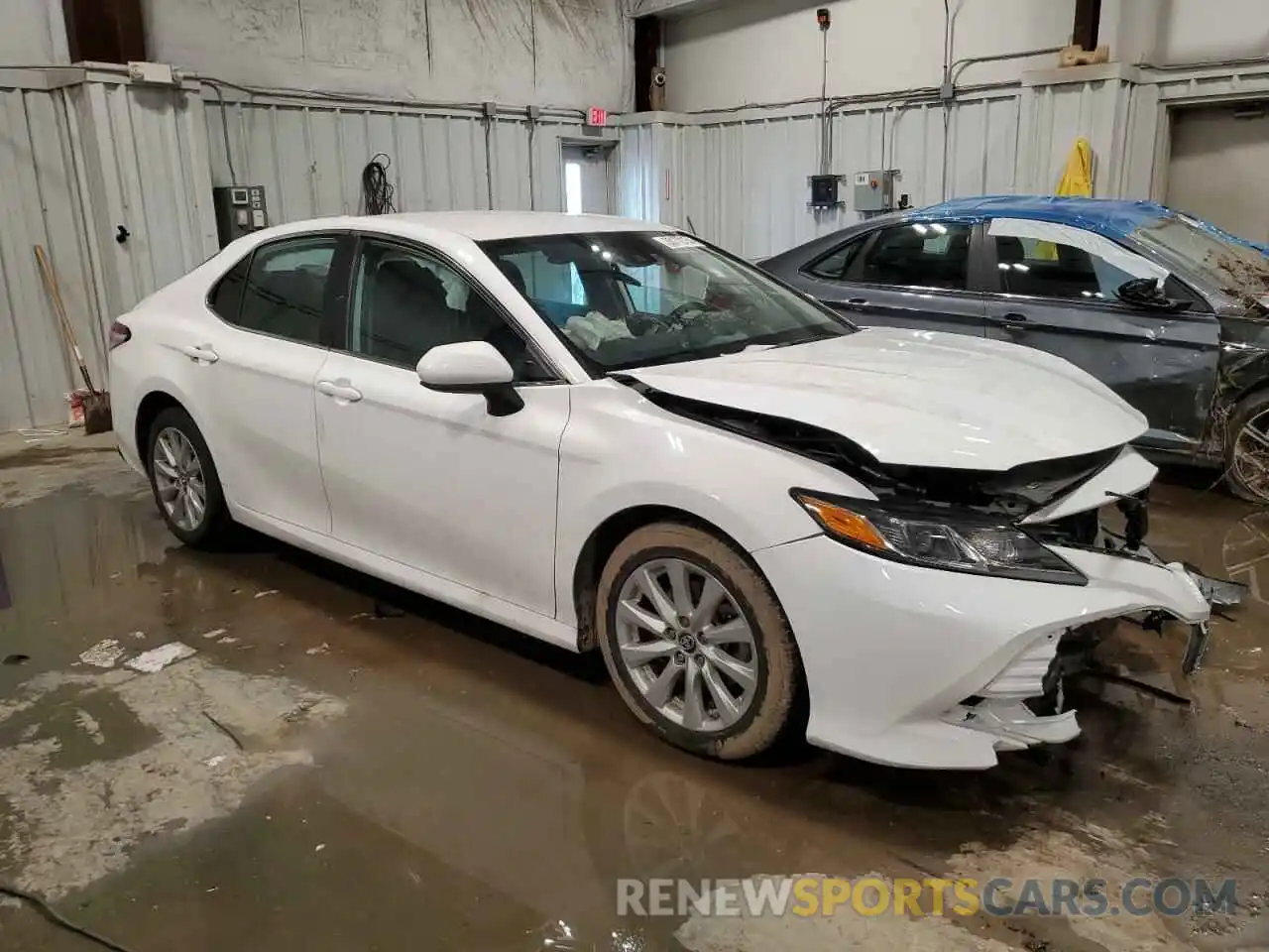 4 Photograph of a damaged car 4T1B11HK4KU260667 TOYOTA CAMRY 2019