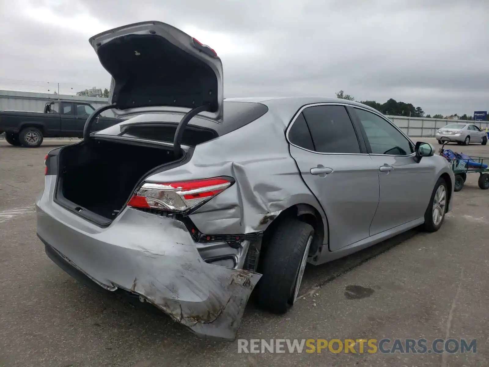 4 Photograph of a damaged car 4T1B11HK4KU261026 TOYOTA CAMRY 2019