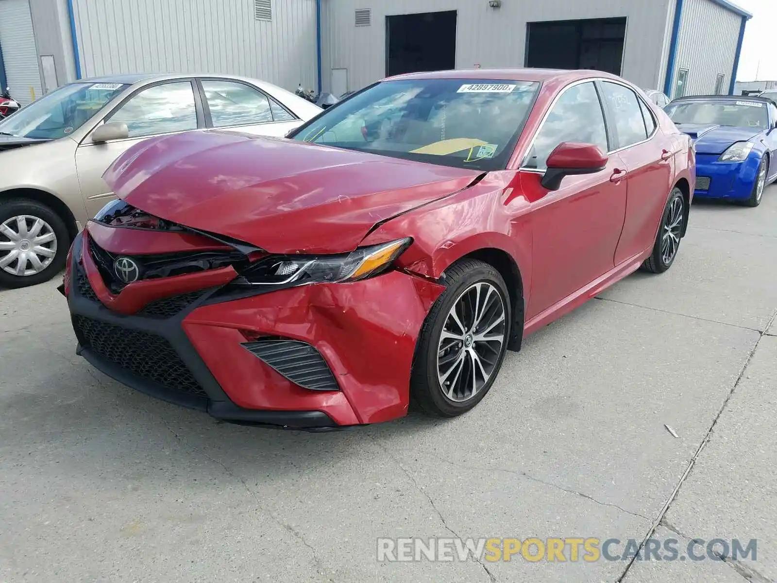 2 Photograph of a damaged car 4T1B11HK4KU261172 TOYOTA CAMRY 2019