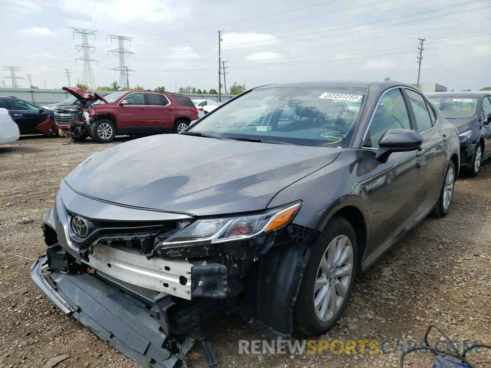 2 Photograph of a damaged car 4T1B11HK4KU261253 TOYOTA CAMRY 2019