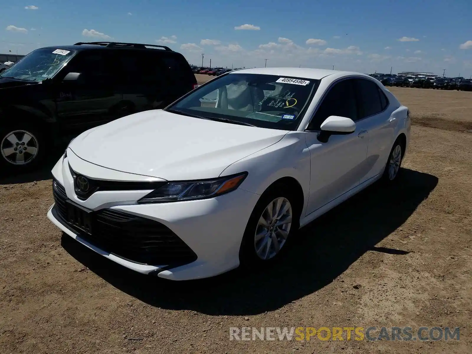 2 Photograph of a damaged car 4T1B11HK4KU261785 TOYOTA CAMRY 2019