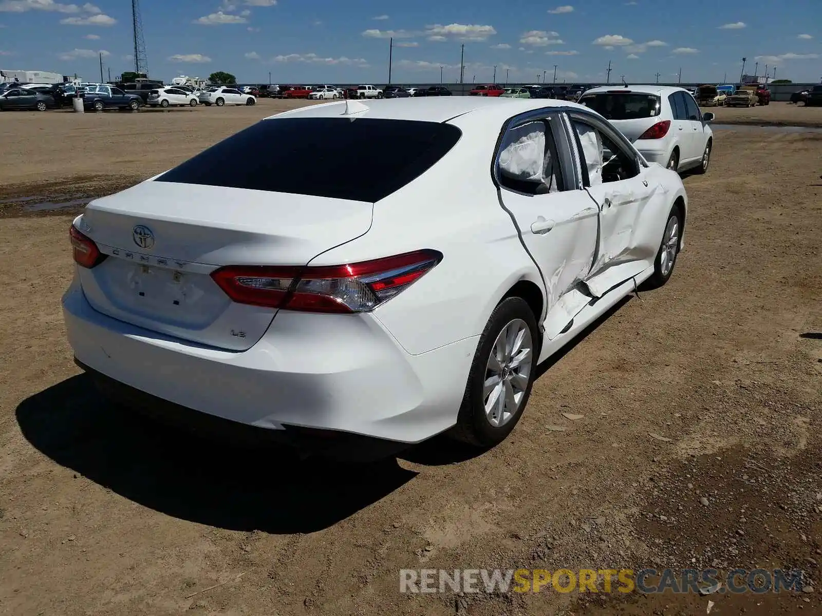 4 Photograph of a damaged car 4T1B11HK4KU261785 TOYOTA CAMRY 2019