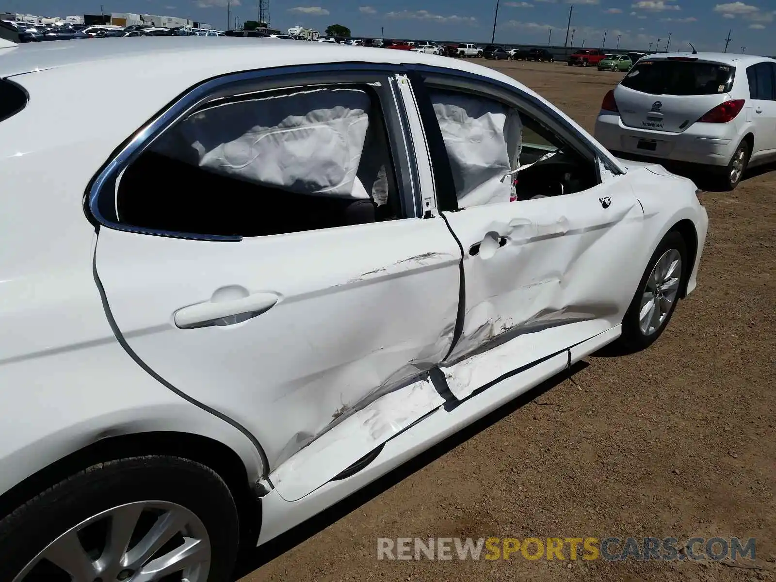 9 Photograph of a damaged car 4T1B11HK4KU261785 TOYOTA CAMRY 2019