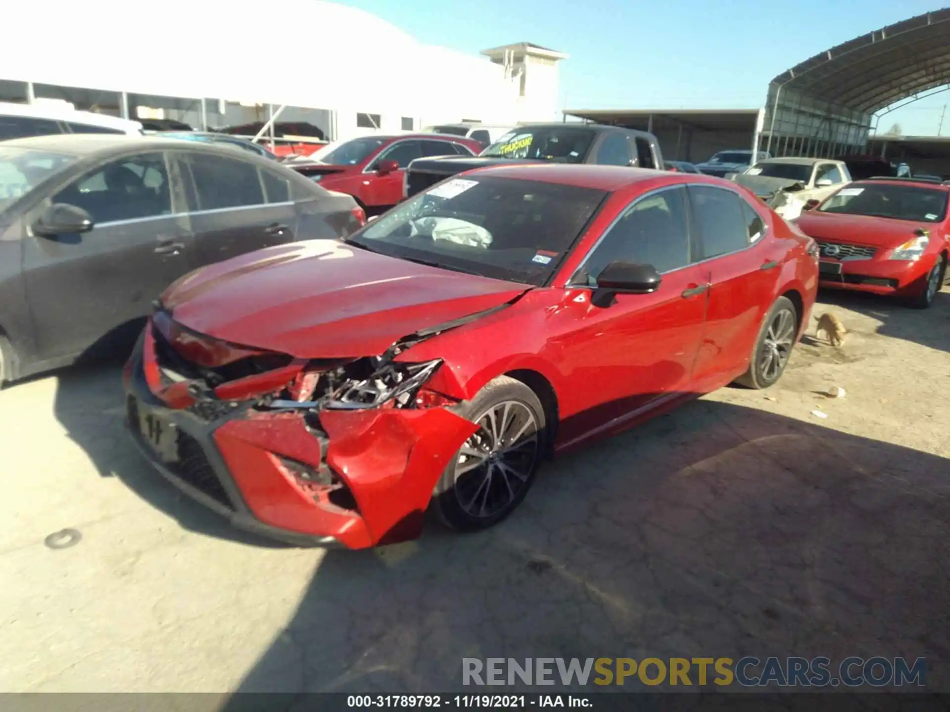 2 Photograph of a damaged car 4T1B11HK4KU262452 TOYOTA CAMRY 2019