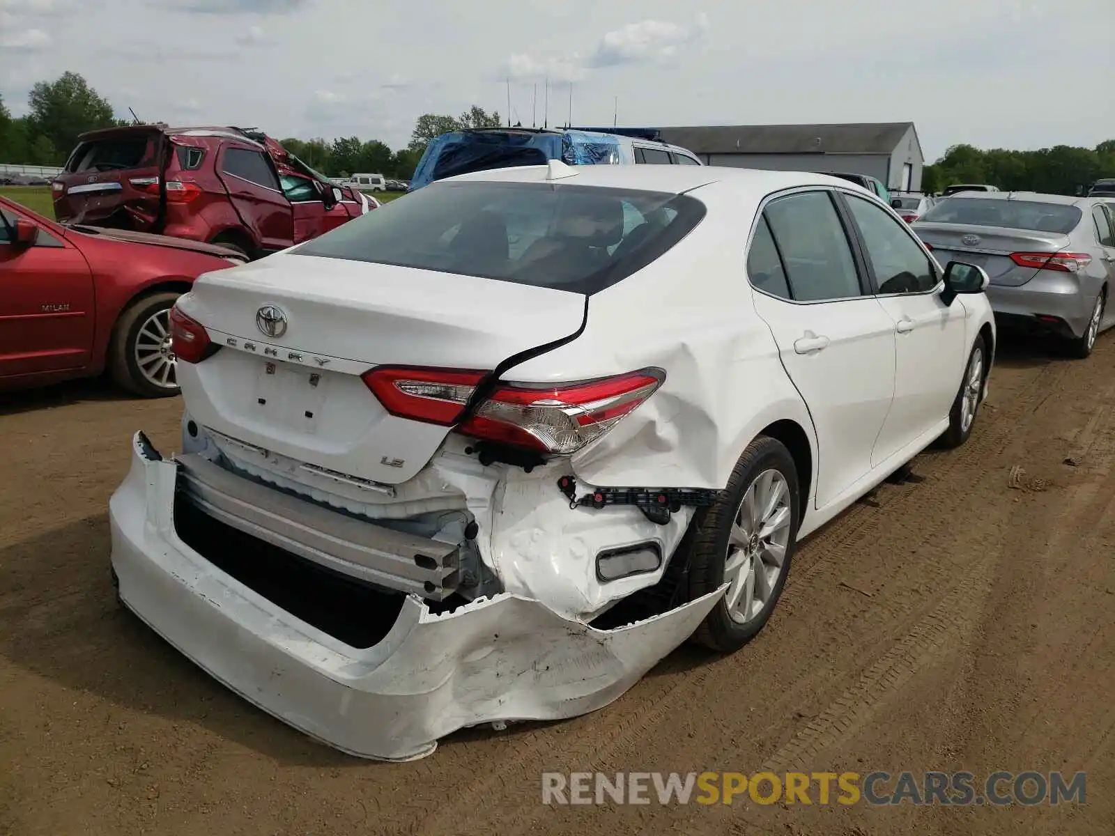 4 Photograph of a damaged car 4T1B11HK4KU262502 TOYOTA CAMRY 2019