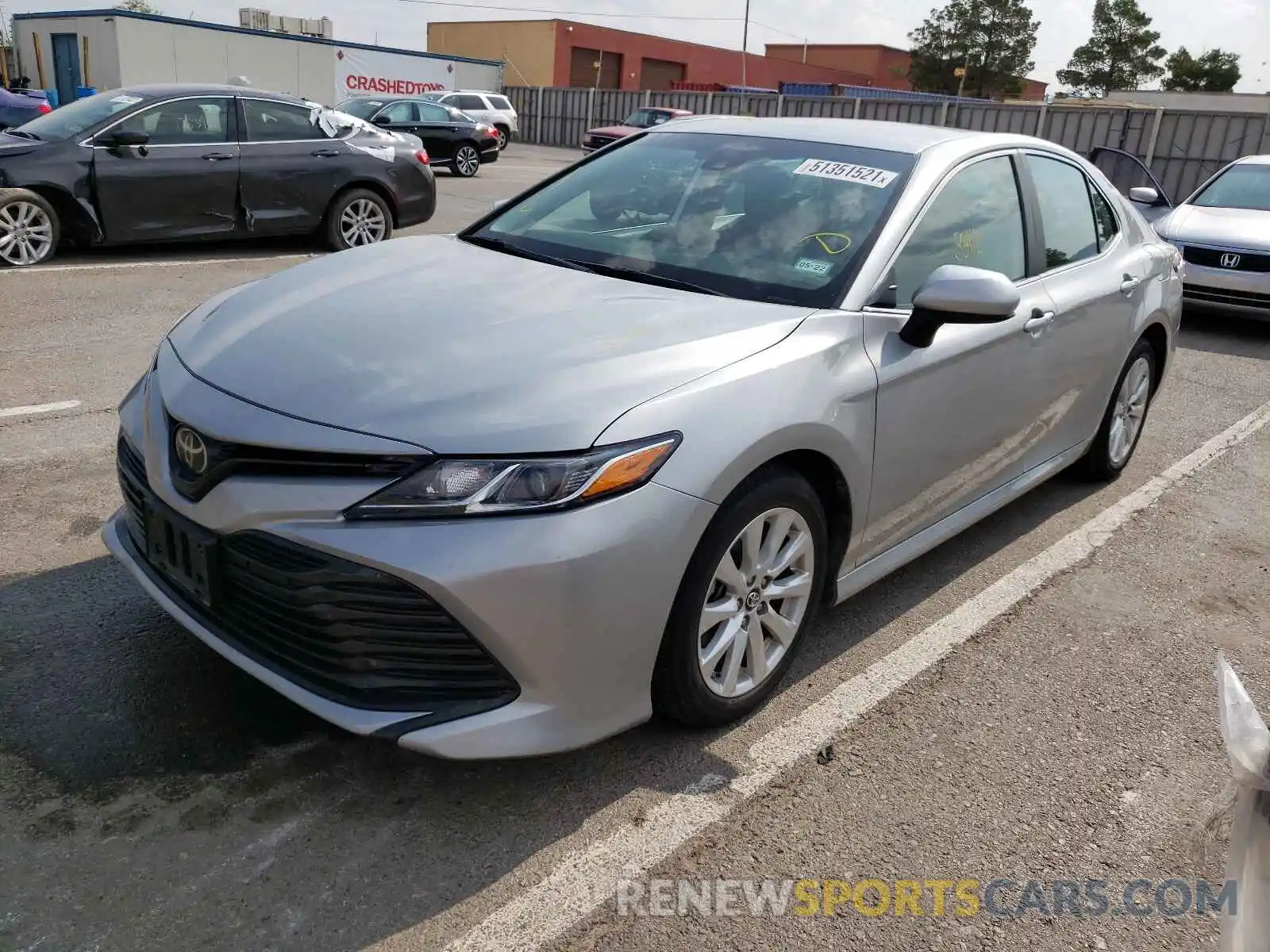 2 Photograph of a damaged car 4T1B11HK4KU263231 TOYOTA CAMRY 2019