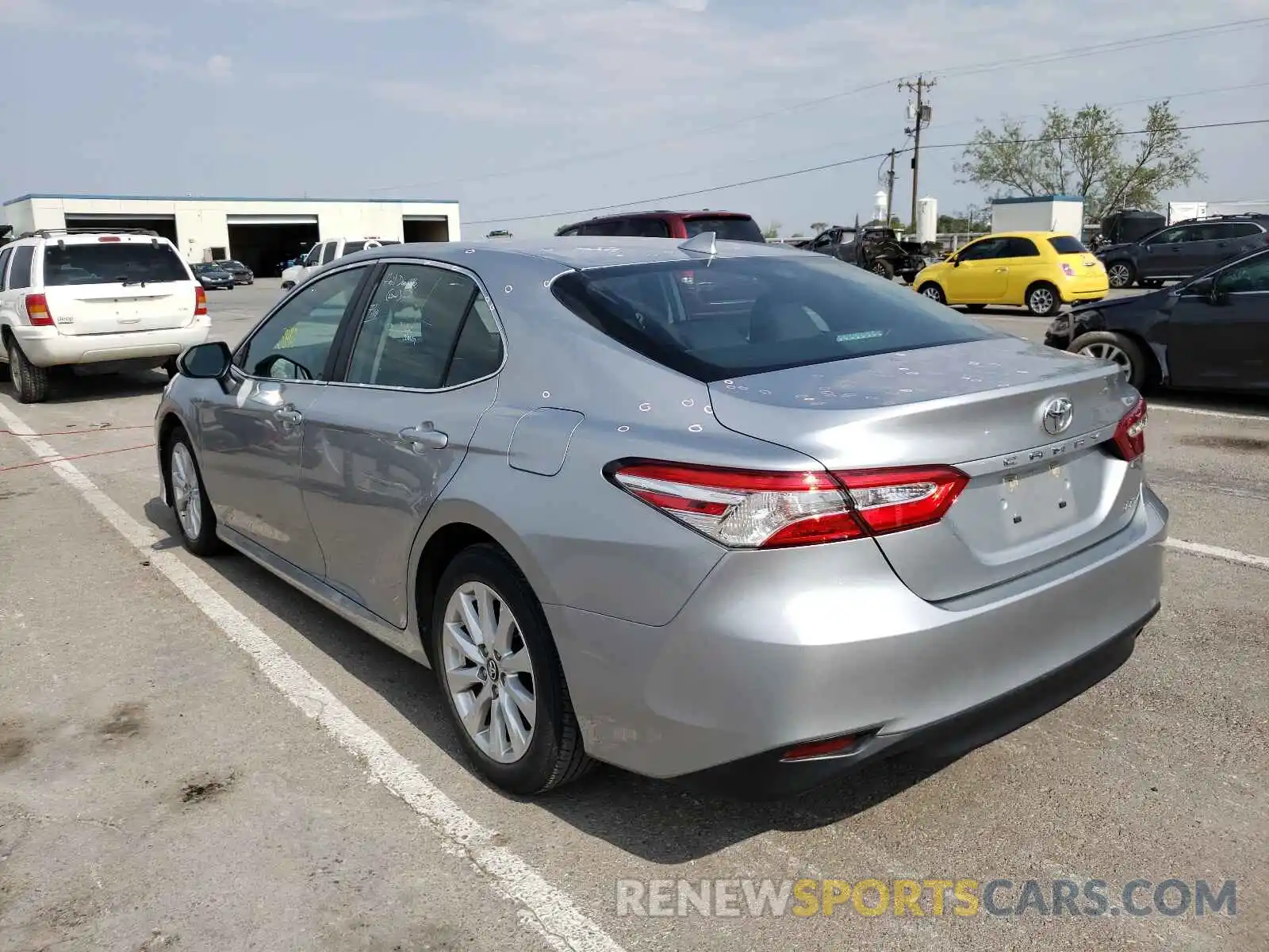 3 Photograph of a damaged car 4T1B11HK4KU263231 TOYOTA CAMRY 2019