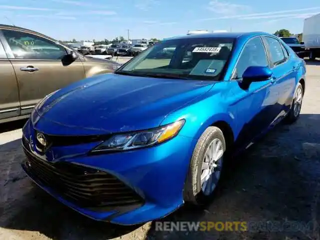 2 Photograph of a damaged car 4T1B11HK4KU263259 TOYOTA CAMRY 2019