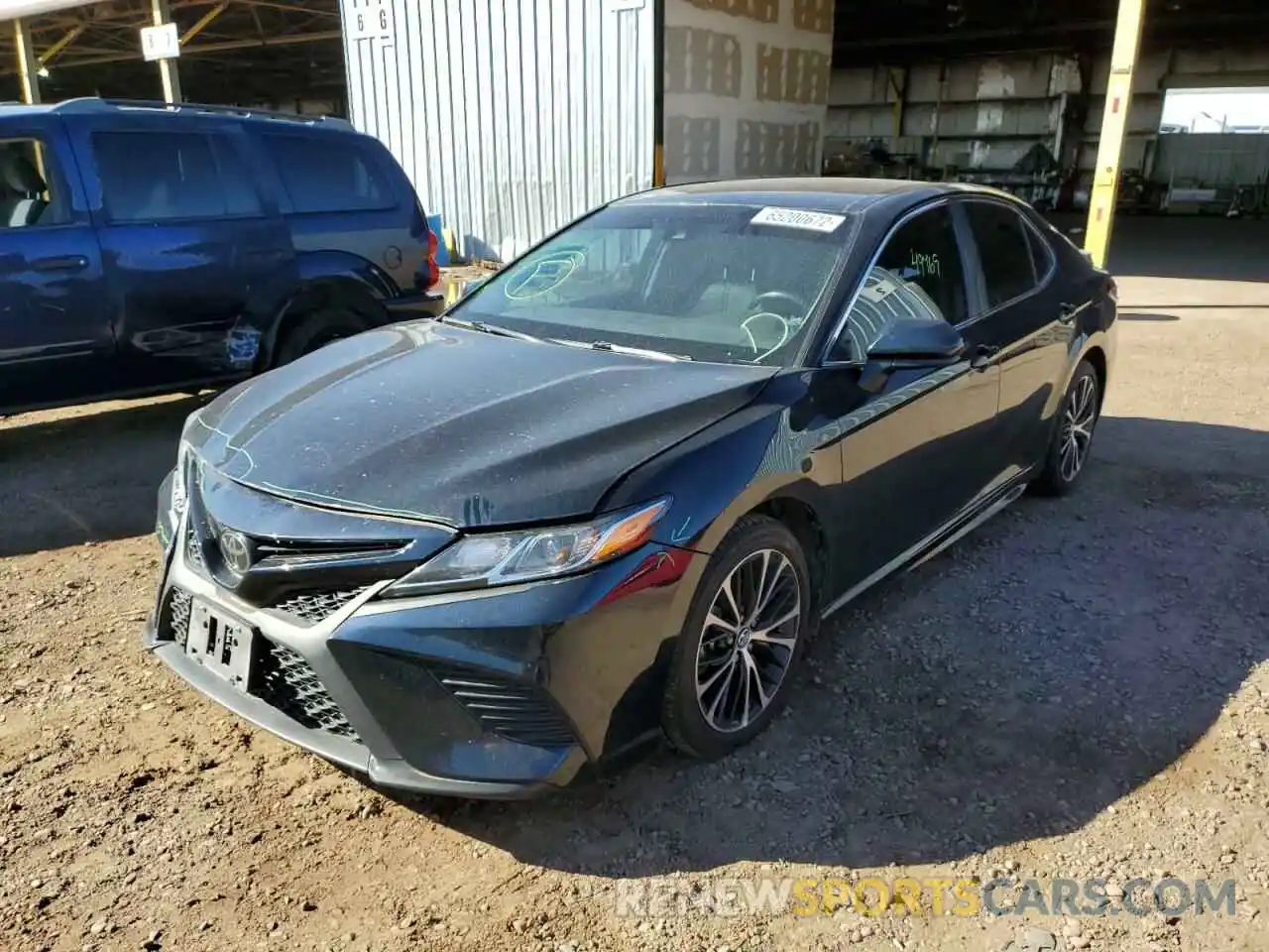 2 Photograph of a damaged car 4T1B11HK4KU264203 TOYOTA CAMRY 2019