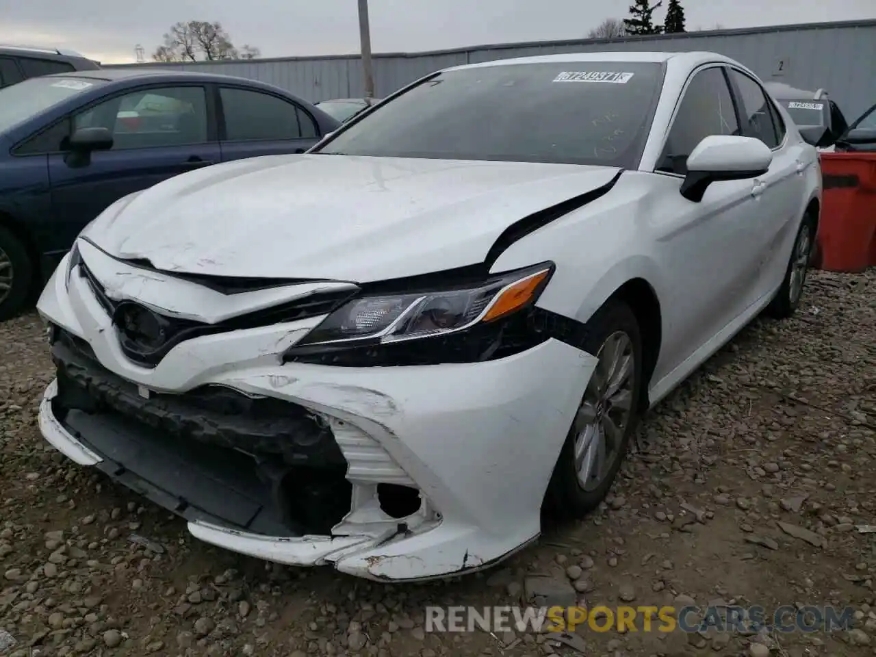 2 Photograph of a damaged car 4T1B11HK4KU264332 TOYOTA CAMRY 2019