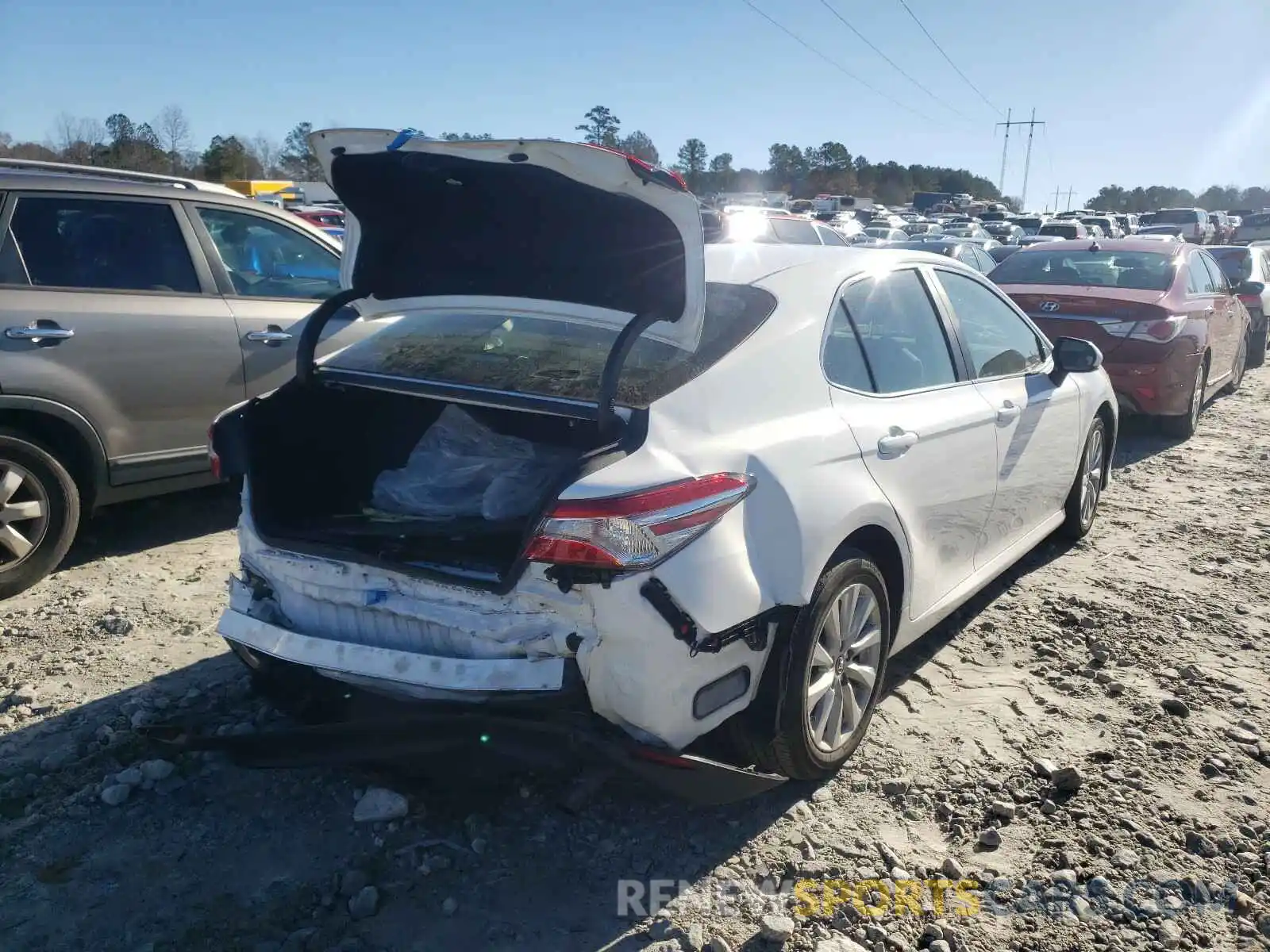 4 Photograph of a damaged car 4T1B11HK4KU265626 TOYOTA CAMRY 2019