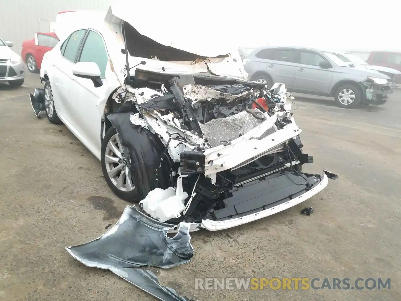 1 Photograph of a damaged car 4T1B11HK4KU268011 TOYOTA CAMRY 2019