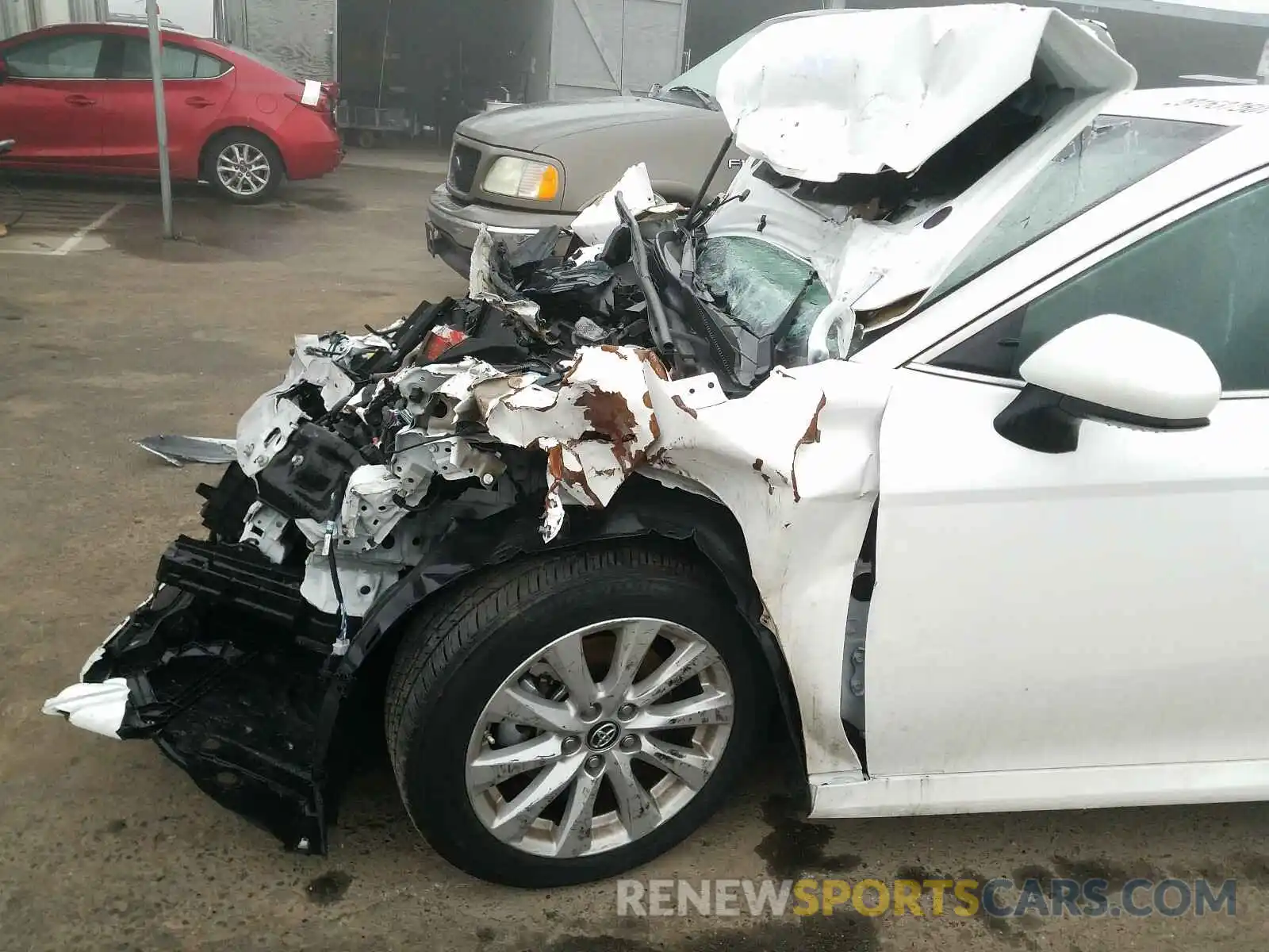 9 Photograph of a damaged car 4T1B11HK4KU268011 TOYOTA CAMRY 2019