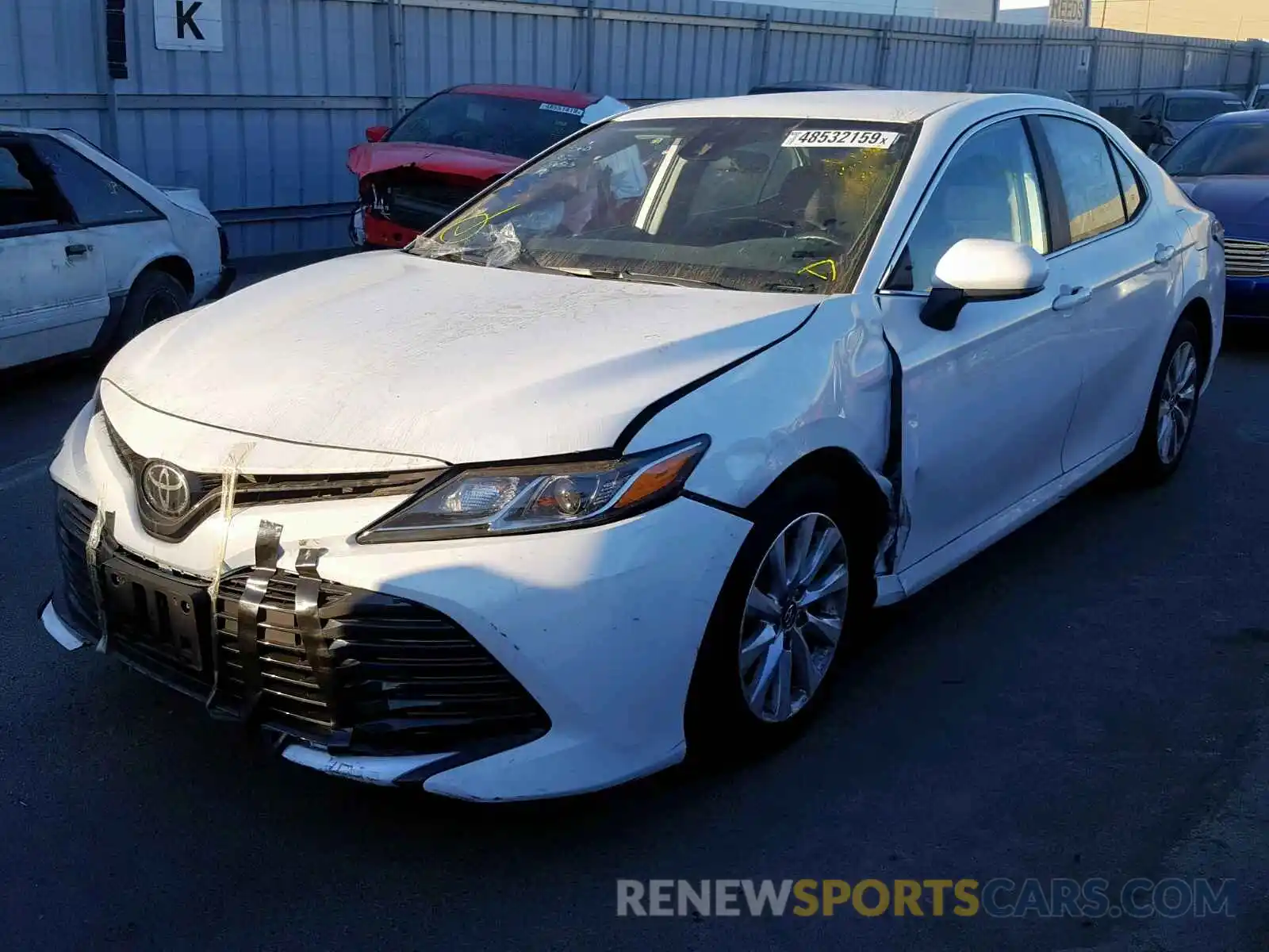 2 Photograph of a damaged car 4T1B11HK4KU268266 TOYOTA CAMRY 2019