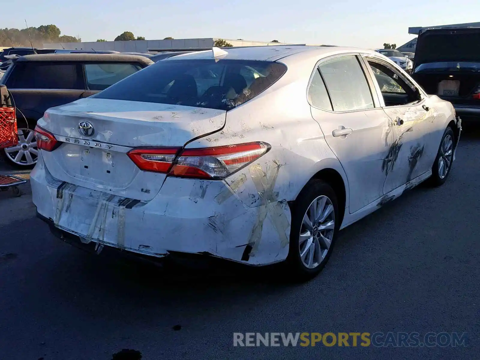 4 Photograph of a damaged car 4T1B11HK4KU268266 TOYOTA CAMRY 2019