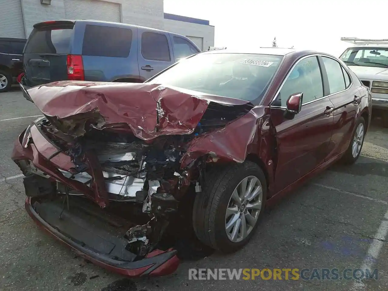 2 Photograph of a damaged car 4T1B11HK4KU268302 TOYOTA CAMRY 2019