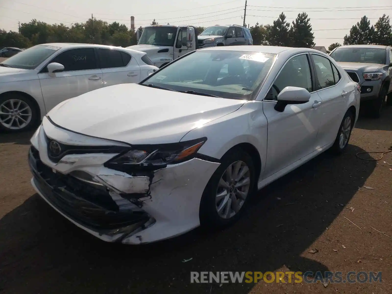 2 Photograph of a damaged car 4T1B11HK4KU269689 TOYOTA CAMRY 2019